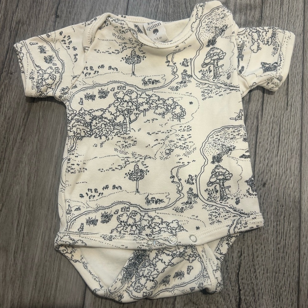 Kate Quinn Cream and Black Bodysuit
